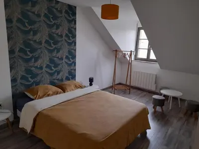 Un ou plusieurs lits dans un hébergement de l'établissement Appartement moderne et spacieux