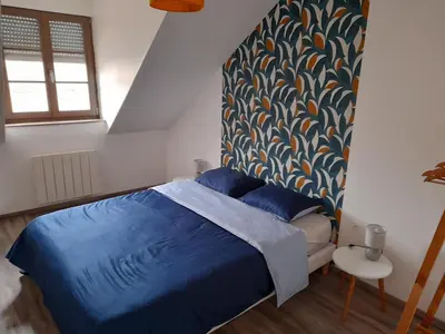 Un ou plusieurs lits dans un hébergement de l'établissement Appartement moderne et spacieux