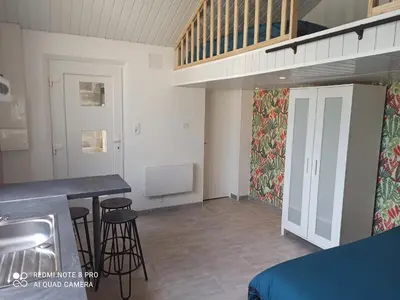 Un ou plusieurs lits dans un hébergement de l'établissement Maisonnette indépendante 4 personnes jardin terrasse