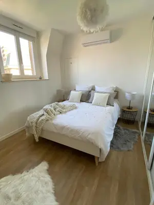 Un ou plusieurs lits dans un hébergement de l'établissement L’ÉLÉGANT: 80m2 vue sur vignoble au Centre d’Epernay!!
