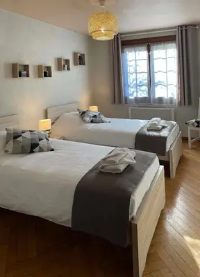 Un ou plusieurs lits dans un hébergement de l'établissement Entre Vignes et Détente
