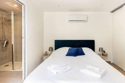 Un ou plusieurs lits dans un hébergement de l'établissement La Grignotière Lodge & Spa