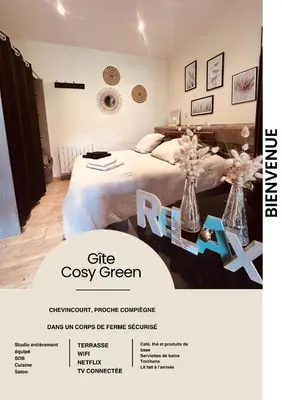 Un ou plusieurs lits dans un hébergement de l'établissement gîte Cosy Green 2