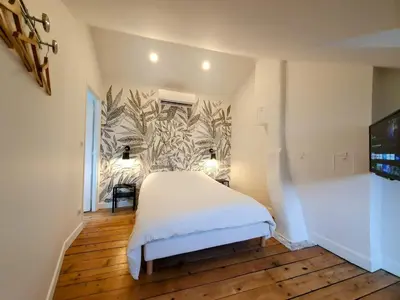 Un ou plusieurs lits dans un hébergement de l'établissement Appartement Premium dans une belle demeure - Hyper centre-ville de Reims