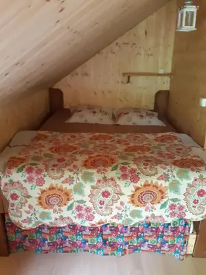 Un ou plusieurs lits dans un hébergement de l'établissement Cabane d'Augustin