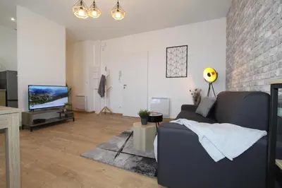 Télévision ou salle de divertissement dans l'établissement L'Urbain by EasyEscale