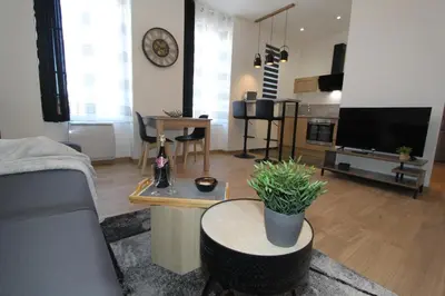 Télévision ou salle de divertissement dans l'établissement L'Urbain by EasyEscale