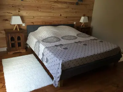 Un ou plusieurs lits dans un hébergement de l'établissement Le Gîte des Murmures