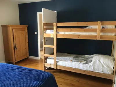 Un ou plusieurs lits dans un hébergement de l'établissement Le Gîte des Murmures