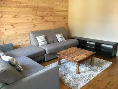 Coin salon dans l'établissement Le Gîte des Murmures