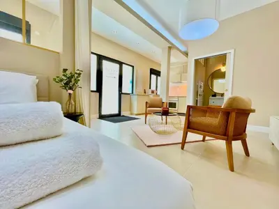 Coin salon dans l'établissement Suite Monceau - Reims