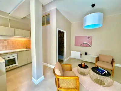 Cuisine ou kitchenette dans l'établissement Suite Monceau - Reims