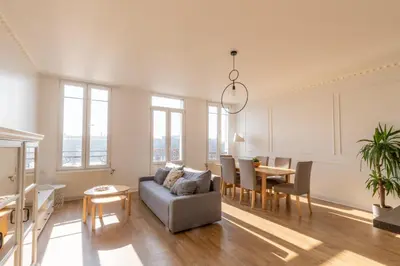 Coin salon dans l'établissement Les Appartements Porte Mars Reims Gare Centre