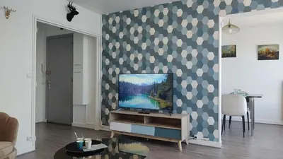 Télévision ou salle de divertissement dans l'établissement Le Thourottois*Centre ville*Wifi*Spacieux*Confort* Saint-Gobain