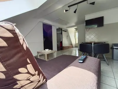 Télévision ou salle de divertissement dans l'établissement Gite BA 3