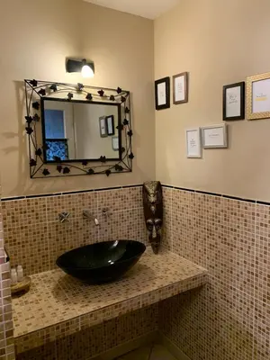 Salle de bains dans l'établissement LA VILLA CAPUCINE