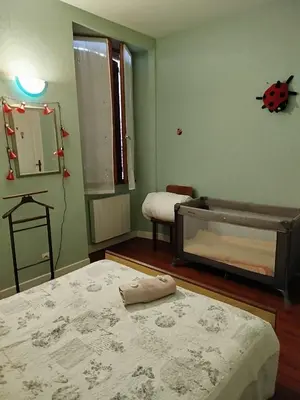Un ou plusieurs lits dans un hébergement de l'établissement Le Relais de la Bulle Enchantée