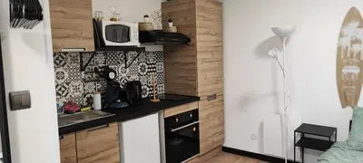 Cuisine ou kitchenette dans l'établissement **Studio Holidays** Centre ville 20 m2
