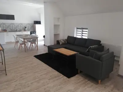 Coin salon dans l'établissement appartement neuf