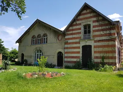 Jardin de l'établissement La Bastide Champenoise - Chambres d'hôtes