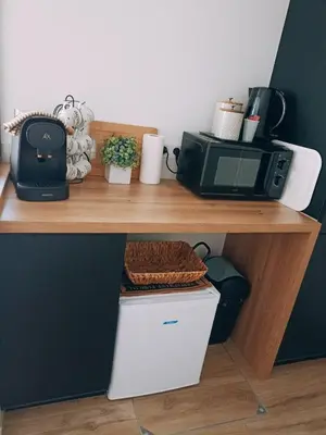 Cuisine ou kitchenette dans l'établissement La suite d'Arches