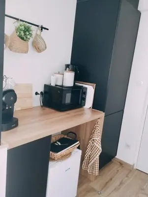 Cuisine ou kitchenette dans l'établissement La suite d'Arches