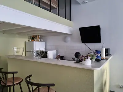 Cuisine ou kitchenette dans l'établissement L’EFFERVESCENT