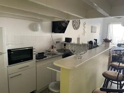 Cuisine ou kitchenette dans l'établissement L’EFFERVESCENT