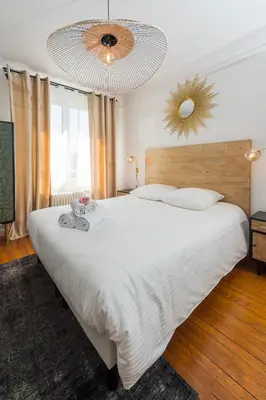 Un ou plusieurs lits dans un hébergement de l'établissement Suites Mana - Le Manaloft, Chic et moderne avec salle privée de Fitness en plein centre-ville de Rethel