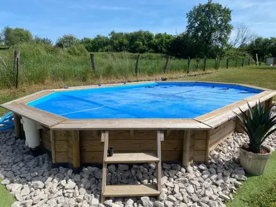 Piscine de l'établissement Les volets bleus ou située à proximité