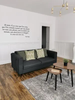Coin salon dans l'établissement Appartement La palette