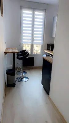 Télévision ou salle de divertissement dans l'établissement Reims Blue Sky