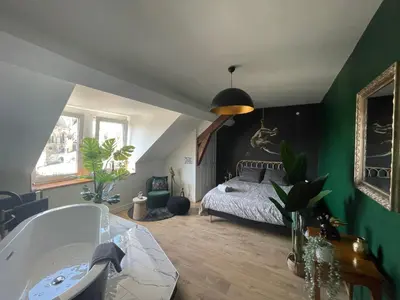 Un ou plusieurs lits dans un hébergement de l'établissement El Circo Gambetta,sublime suite balnéo hypercentre