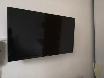 Télévision ou salle de divertissement dans l'établissement STUDIO COSY- CHALEUREUX- QUARTIER CALME- Wifi