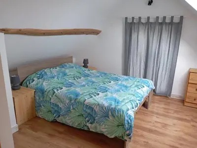 Un ou plusieurs lits dans un hébergement de l'établissement Maison au calme