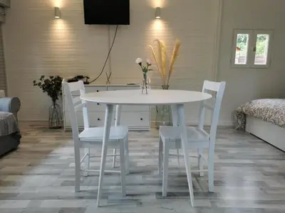 Télévision ou salle de divertissement dans l'établissement Au Chalet de la Nature