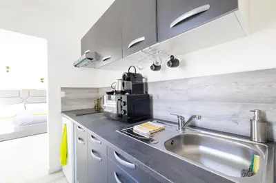 Cuisine ou kitchenette dans l'établissement GLM GROUPE - GLM Résidences 1