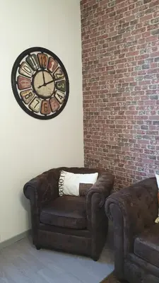 Coin salon dans l'établissement Le Loft Vintage Epernay avec Netflix, Vélos, Parking gratuit