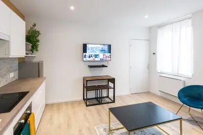 Cuisine ou kitchenette dans l'établissement Désirée Logement Cosy et Charmant 1 er étage