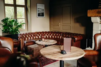 Coin salon dans l'établissement DOMAINE DES LUMIERES