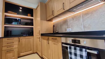 Cuisine ou kitchenette dans l'établissement Le Moulin Dort Hyper Centre Gare Disney