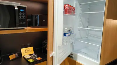 Cuisine ou kitchenette dans l'établissement Le Moulin Dort Hyper Centre Gare Disney