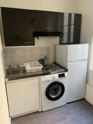 Cuisine ou kitchenette dans l'établissement Le Voltaire 4 chez Adrien Hyper centre