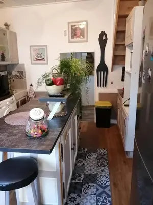 Cuisine ou kitchenette dans l'établissement Maison cocoon et chaleureuse