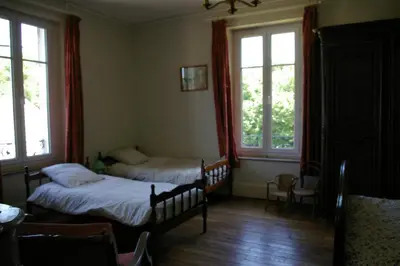 Un ou plusieurs lits dans un hébergement de l'établissement La Folia - Ferme de Lucqy