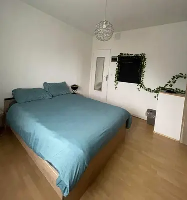 Un ou plusieurs lits dans un hébergement de l'établissement Le Ranch - chambres d'hôtes - proche centre ville