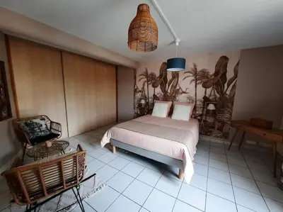 Un ou plusieurs lits dans un hébergement de l'établissement La Loggia superbe appartement