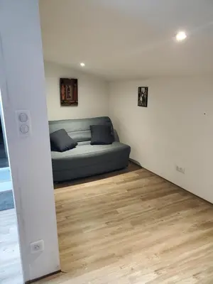 Coin salon dans l'établissement Gite Comme a la maison