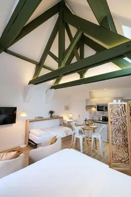 Un ou plusieurs lits dans un hébergement de l'établissement Villa Forestière Studio l'Olivier