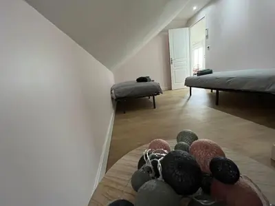 Un ou plusieurs lits dans un hébergement de l'établissement Gîte le Presbytère de Blérancourt